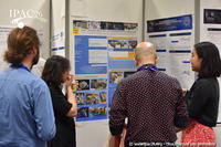 Sasha Horney explaining her poster to IPAC delegates
